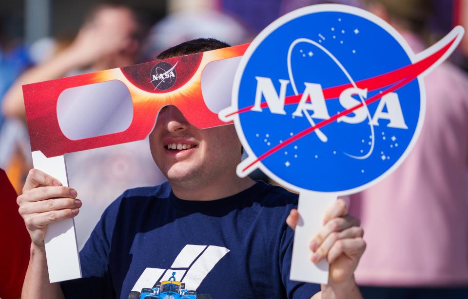 Thousands of people flock to Indianapolis Motor Speedway on April 8, 2024, to watch the total solar eclipse.