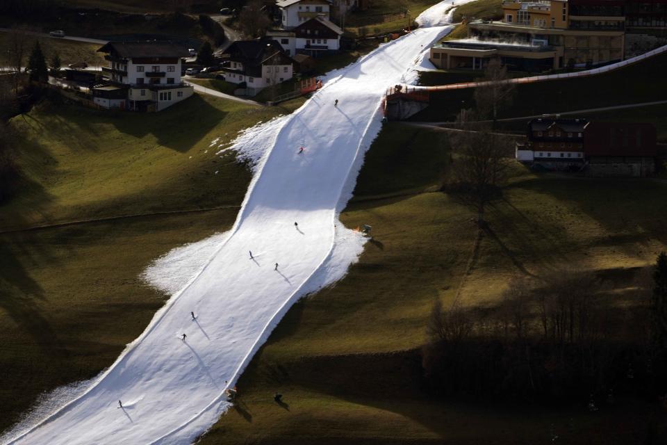 People ski on a slope near Schladming, Austria, Friday, Jan. 6, 2023.(AP Photo/Matthias Schrader)