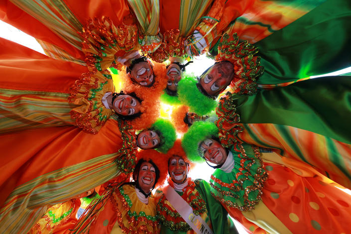 The Hi-Roller Skating Clowns gather in a circle above the photographer before in the 93rd Macy's Thanksgiving Day Parade in New York, Nov. 28, 2019. (Photo: Gordon Donovan/Yahoo News) 
