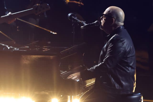 <p>Amy Sussman/Getty Images</p> Billy Joel performs at the 2024 Grammys