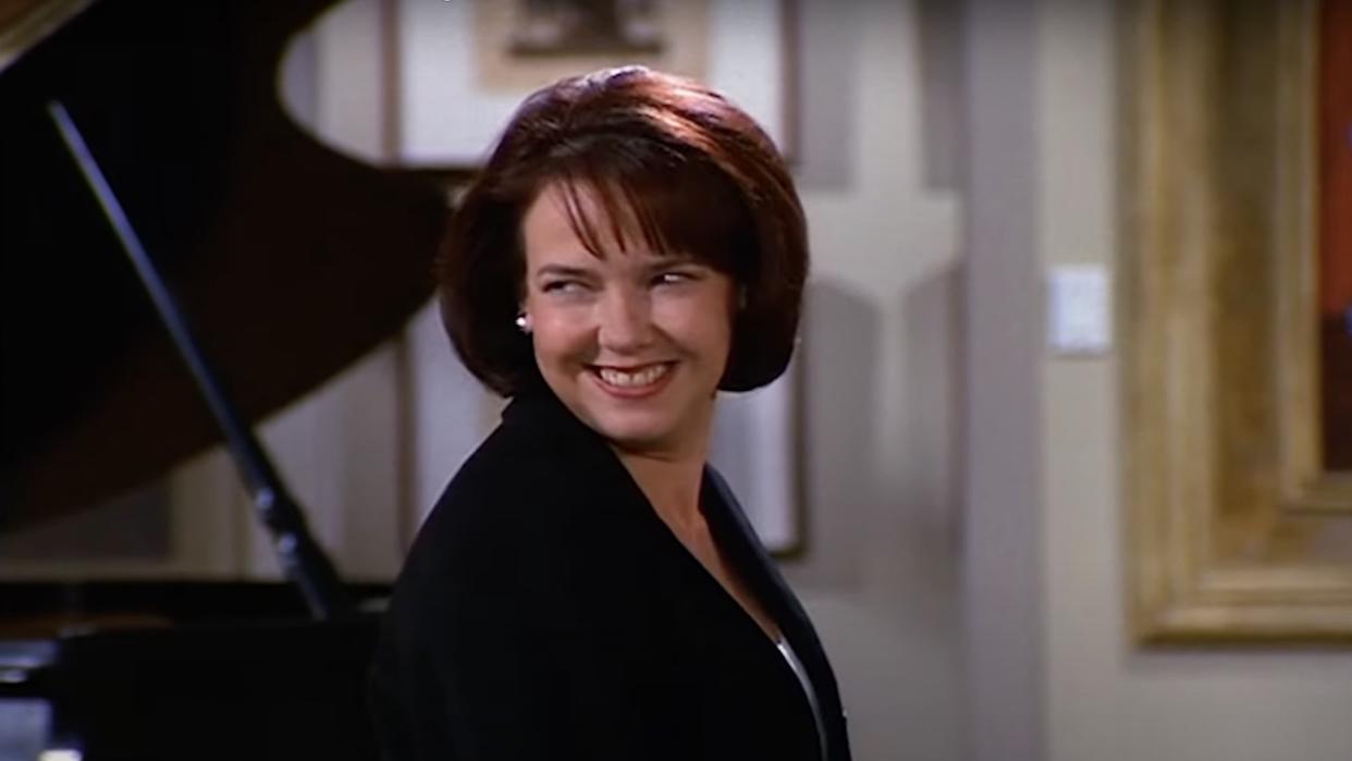  Harriet Sansom Harris' Bebe smiling in Frasier's apartment. 