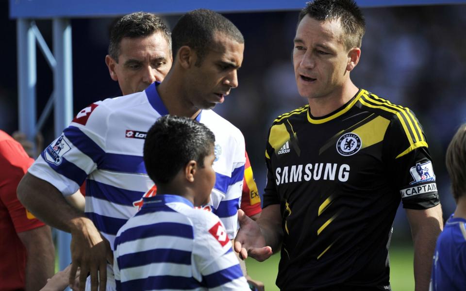 Queens Park Rangers' English defender Anton Ferdinand and John Terry in 2011 - AFP