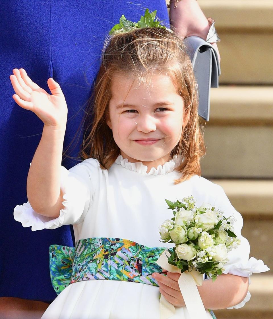 <p>Princess Charlotte is practically a professional royal bridesmaid at this point. Here she is waving to the crowd at Princess Eugenie's wedding.</p>