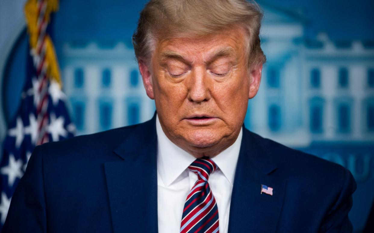 Donald Trump speaks at a press conference at the White House - Shutterstock