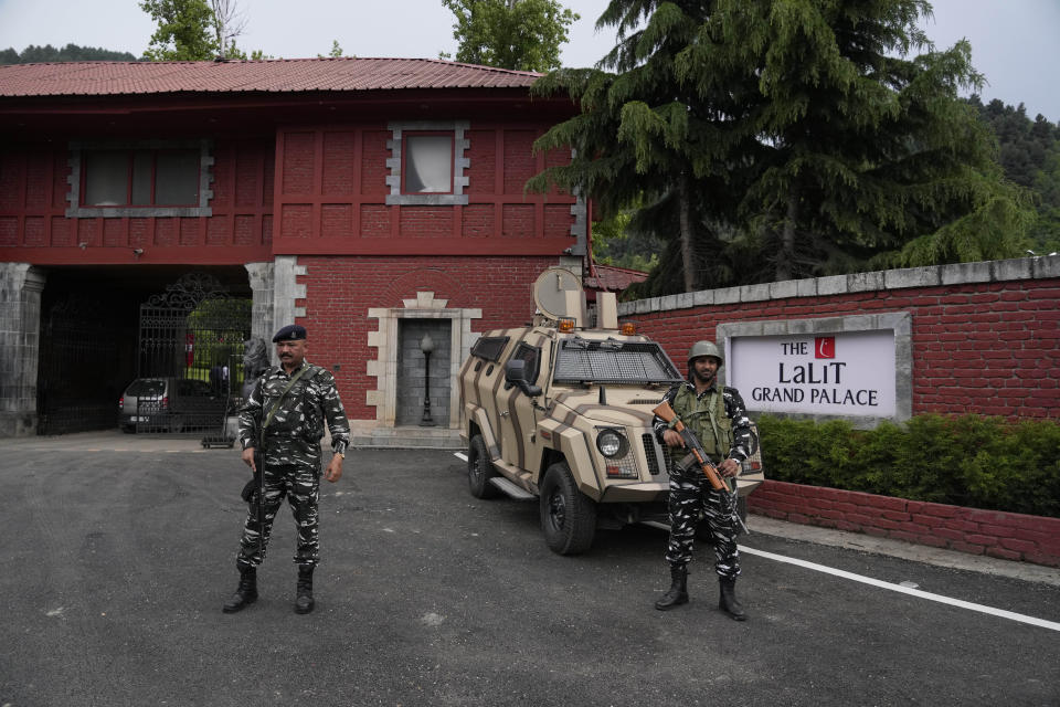 Indian paramilitary soldiers guard near the venue for the G20 tourism working group meeting in Srinagar Indian controlled Kashmir, Wednesday, May 17, 2023. Indian authorities have stepped up security and deployed elite commandos to prevent rebel attacks during the meeting of officials from the Group of 20 industrialized and developing nations in the disputed region next week. (AP Photo/Mukhtar Khan)