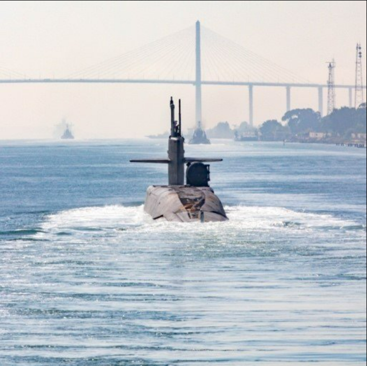 An Ohio-class guided missile submarine in what appears to be the Suez Canal in Egypt as it has entered the responsibility of US Central Command, which oversees operations in the Middle East. The Ohio-class submarine bears the name of the buckeye state.