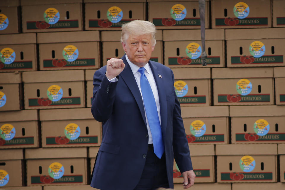 President Donald Trump arrives to speak about the "Farmers to Families Food Box Program" at Flavor First Growers and Packers, Monday, Aug. 24, 2020, in Mills River, N.C. (AP Photo/Nell Redmond)