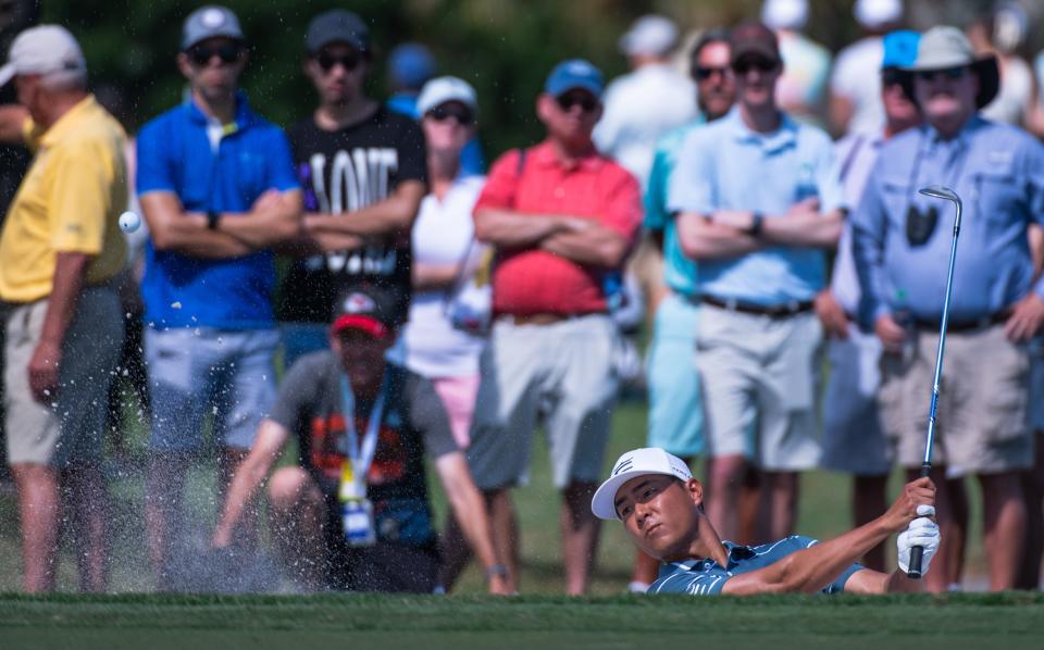 Justin Suh hits out of a sand trap on the fourth hole during the third round of the Honda Classic at PGA National Resort & Spa on Saturday, February 25, 2023, in Palm Beach Gardens, FL.