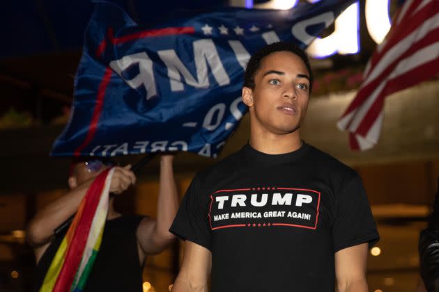 Christian Walker, son of Herschel Walker, and LGBTQ people and allies in Southern California hold a march in Los Angeles in support of Donald Trump a couple of weeks before the 2020 election. (Photo: Chelsea Lauren/Shutterstock)