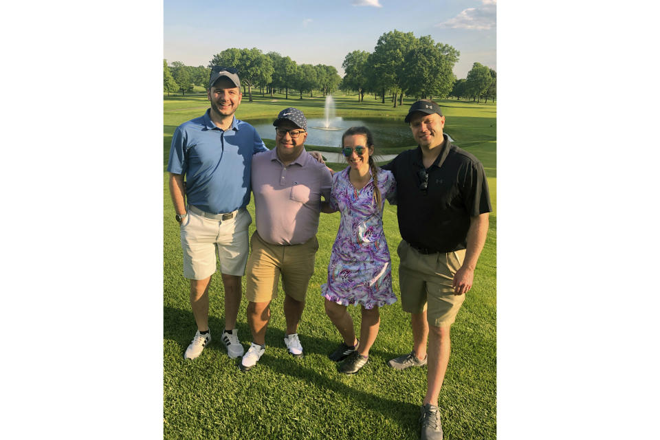 This undated photo provided by Alisha Jernack shows Alisha Jernack, with John Confrey, left, Jason Pourakis, second from left, and Ryan Berdnik, right, all of Mazars USA LLP at Upper Montclair Country Club in Clifton, N.J. Jernack draws a direct line from some of the relationships she has established on the golf course to increased opportunities at work. (Alisha Jernack via AP)