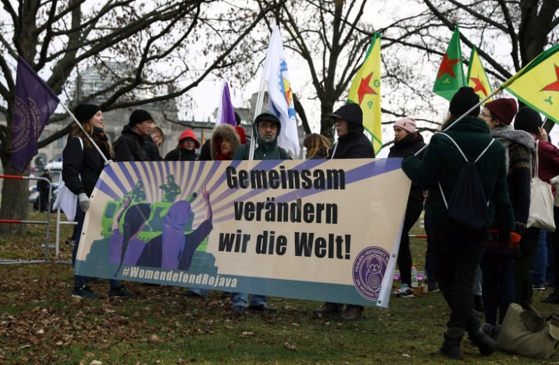 Protesters take part in a demonstration against Turkish President Tayyip Erdogan participating in the Libya summit in Berlin