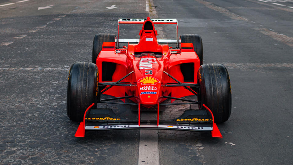 The Ferrari F300 race car driven by Michael Schumacher to four Grand Prix victories during the 1998 Formula 1 season. - Credit: Kevin Van Campenhout, courtesy of RM Sotheby's.