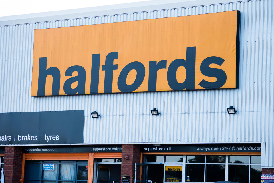 RAYLEIGH, ENGLAND - SEPTEMBER 03: A general view of signage on an Halfords superstore and autocentre on September 3, 2019 in Rayleigh, England. (Photo by John Keebls/Getty Images)