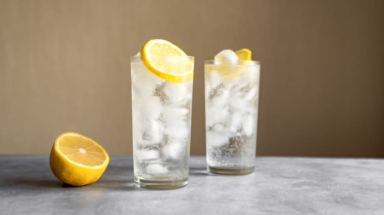 two clear collins cocktails