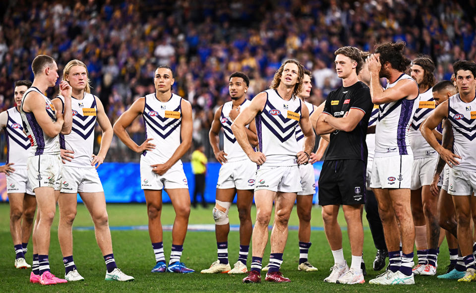 Fremantle Dockers players, pictured here after their loss to West Coast.