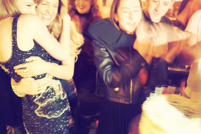 <p>Blake Lively/Instagram</p> Blake Lively and Taylor Swift hug at Swift's 34th birthday party.