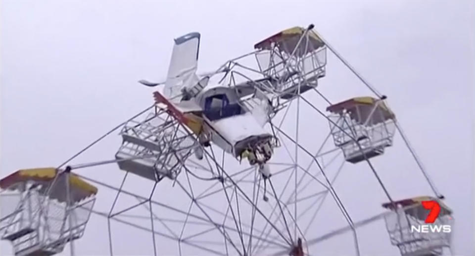 The chilling screams of onlookers and children trapped on a Ferris wheel were heard on video as the light plane brought their ride to a frightening end. Source: 7 News