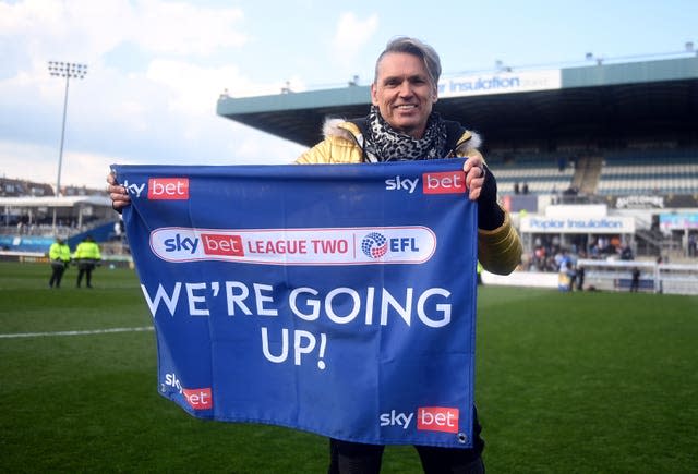 Forest Green Rovers owner Dale Vince celebrates after securing promotion