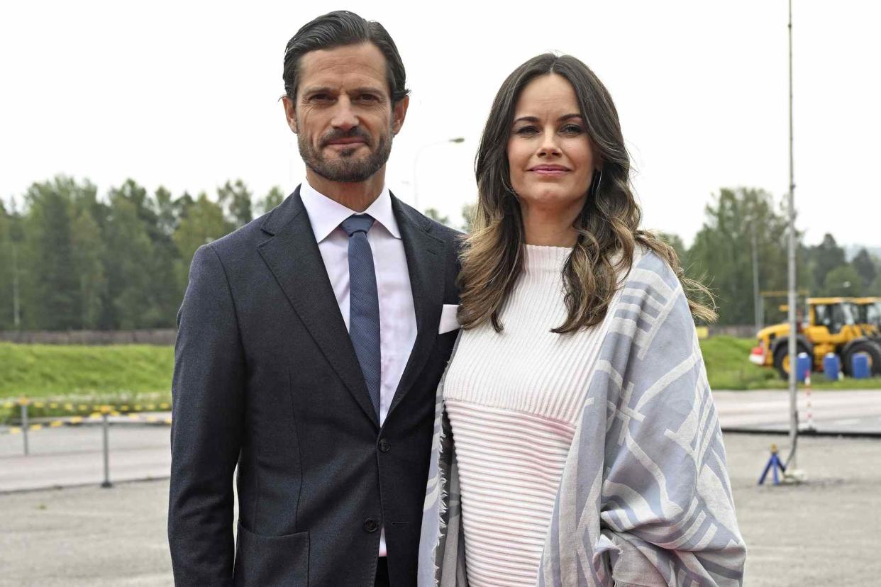 <p>Fredrik Sandberg/TT/Shutterstock</p> Prince Carl Philip and Princess Sofia of Sweden at Volvo CE in Arvika, Varmland, Sweden on Sept. 4, 2024.