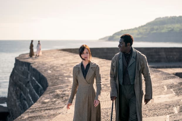 Anne takes a walk along the water in Lyme.<p>Photo: Nick Wall/Courtesy of Netflix</p>