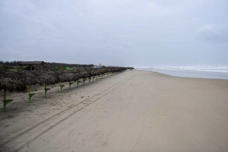 Tire tracks mark the sand on a deserted beach in Miramar, in the southwestern Gulf of Mexico, Wednesday, June 19, 2024. Tropical Storm Alberto formed on Wednesday in the southwestern Gulf of Mexico, the first named storm of the hurricane season. (AP Photo/Fabian Melendez)