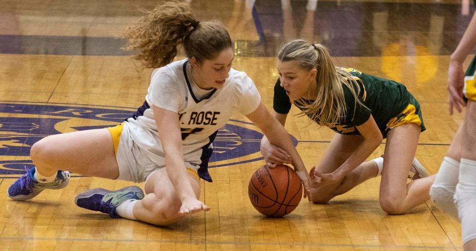 St. Rose Jada Lynch and Red Bank Addy Nyemchek battle for loose ball. Red Bank Catholic Girls Basketball edges out St. Rose on February 2, 2023 in Belmar, NJ. 
