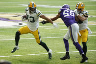 Green Bay Packers wide receiver Allen Lazard (13) runs from Minnesota Vikings outside linebacker Anthony Barr (55) during the first half of an NFL football game, Sunday, Sept. 13, 2020, in Minneapolis. (AP Photo/Bruce Kluckhohn)