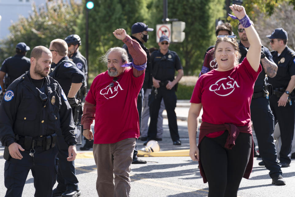 Demonstrators are arrested by U.S. Capitol Police as they protest in support of the Deferred Action for Childhood Arrivals (DACA), during a demonstration on Capitol Hill in Washington, Thursday, Oct. 6, 2022. ( AP Photo/Jose Luis Magana)