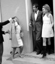 <p>In typical '60s style, actress Jane Fonda wore a high neck, sleeveless white mini dress, and tall black-heeled boots to marry French director Roger Vadim in 1965. </p>