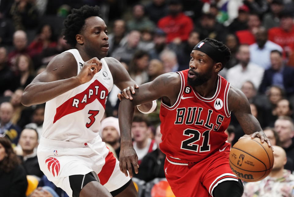 Chicago Bulls guard Patrick Beverley (21) tries to get past Toronto Raptors forward O.G. Anunoby (3) during the first half of an NBA basketball game Tuesday, Feb. 28, 2023, in Toronto. (Frank Gunn/The Canadian Press via AP)