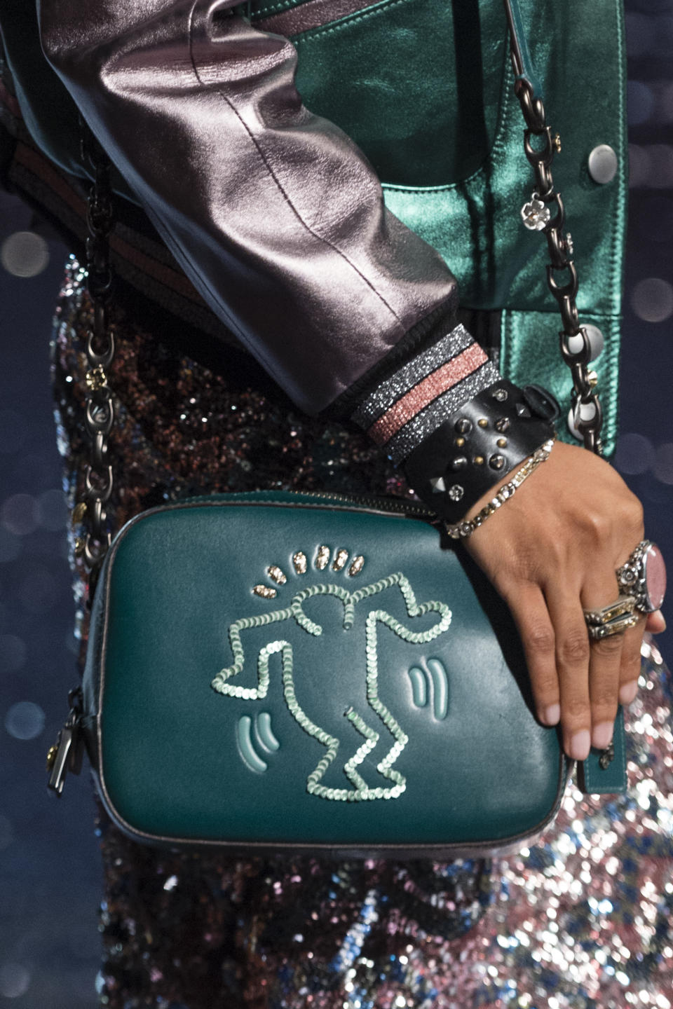 <p><i>Teal leather handbag with Keith Haring emblem from the SS18 Coach collection. (Photo: ImaxTree) </i></p>