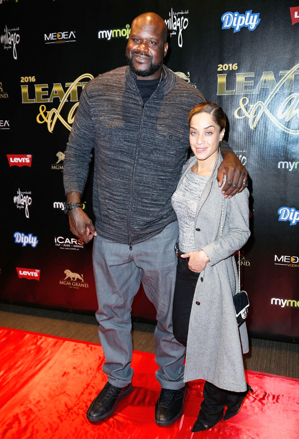 Of course, Shaquille O'Neal took his petite girlfriend, Laticia Rolle, as his date for the “Leather & Laces” event. (Photo: Randy Shropshire/Getty Images)