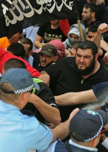 Australian police clash with Muslim protesters in Sydney