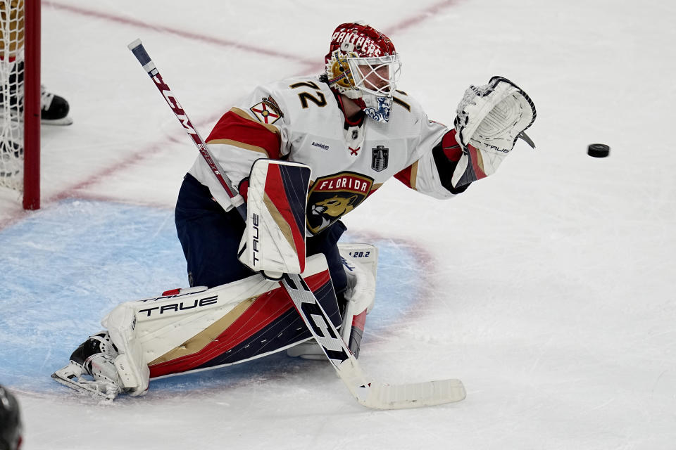 Florida Panthers goaltender Sergei Bobrovsky (72) stops a shot on goal against the Vegas Golden Knights during the second period of Game 1 of the NHL hockey Stanley Cup Finals, Saturday, June 3, 2023, in Las Vegas. (AP Photo/Abbie Parr)