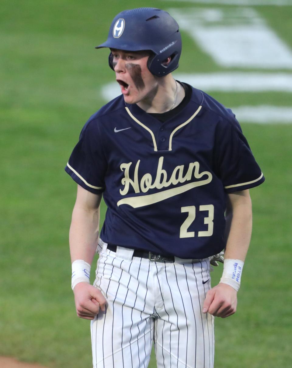 Hoban's Michael Ciavolella celebrates scoring a run in the sixth inning against St. Vincent-St. Mary on Sunday, April 24, 2022 at Canal Park.