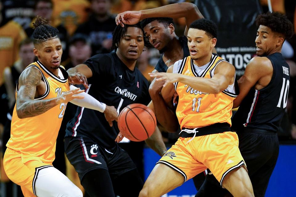 Shown playing against the University of Cincinnati Bearcats Nov. 16, Northern Kentucky forward Chris Brandon (21) had 10 boards against Robert Morris on Saturday while Xavier Rhodes (11) scored 12 points.