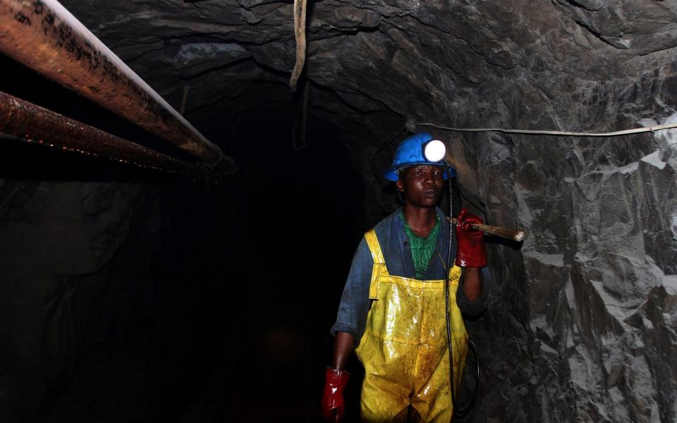 Mining in Zimbabwe: a worker underground at Metallon gold mine in Shamva