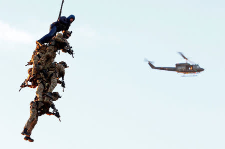 Belgian army Special Forces are seen during the Black Blade military exercise involving several European Union countries and organised by the European Defence Agency at Florennes airbase, Belgium November 30, 2016. REUTERS/Yves Herman