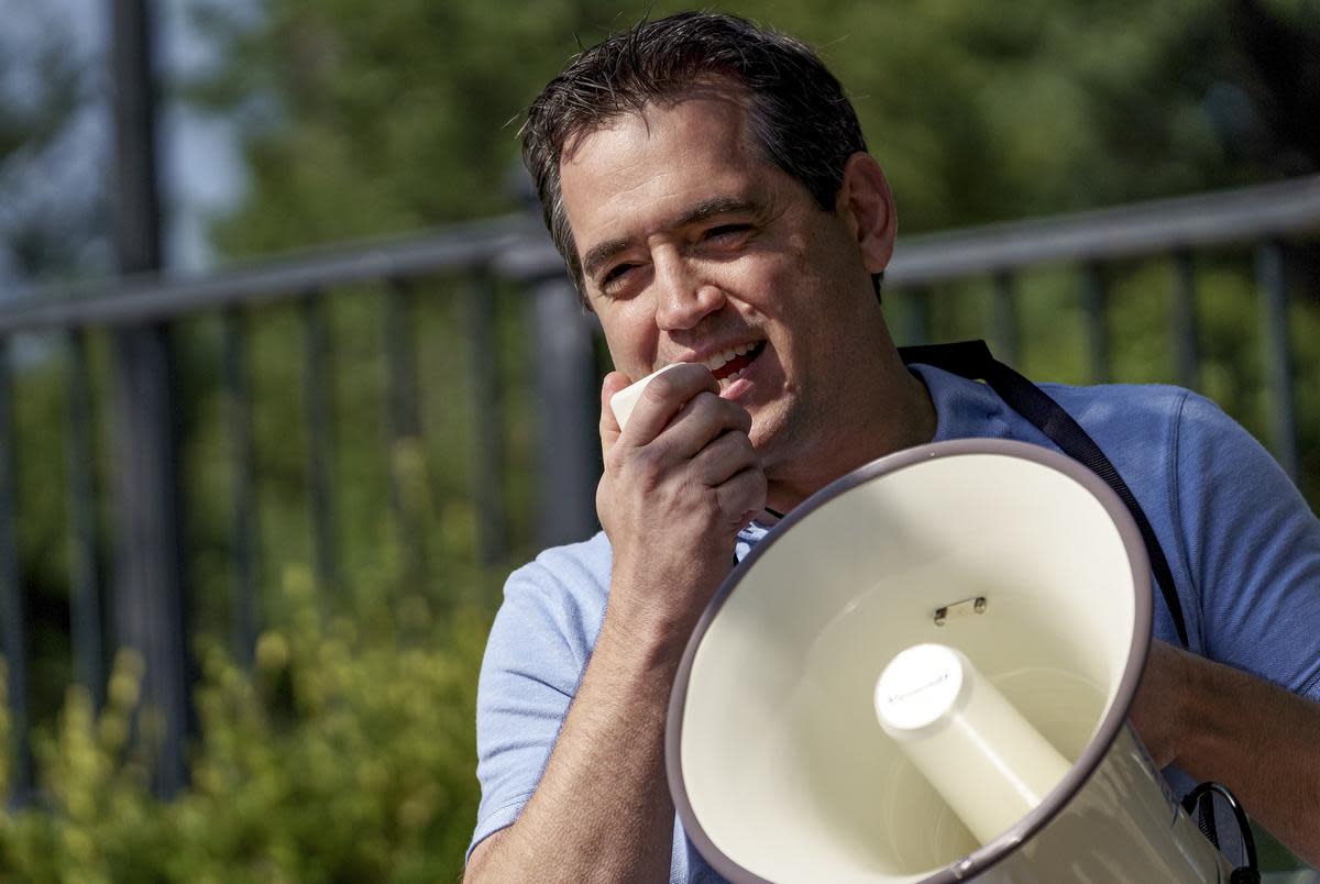 Former state representative Matt Rinaldi spoke to demonstrators at the Governor’s Mansion in protest of Gov. Abbott’s executive orders to close businesses and mandate masks during the COVID-19 pandemic.