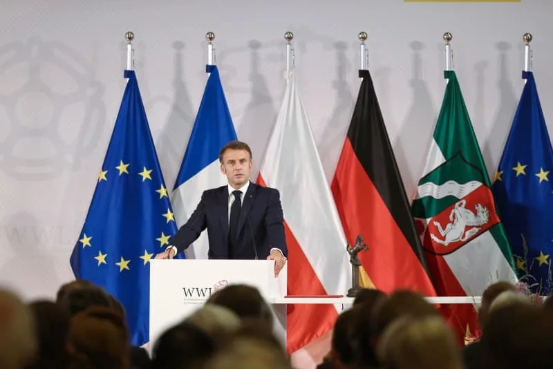 Emmanuel Macron, President of France, speaks in the ballroom of Muenster's historic town hall at the award ceremony for the International Peace of Westphalia Prize. French President Macron and his wife are on a three-day state visit to Germany at the invitation of German President Steinmeier. Rolf Vennenbernd/dpa