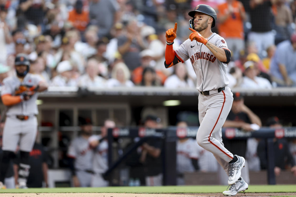 San Francisco Giants' Grant McCray celebrates after hitting a three-run home run during the second inning of a baseball game against the San Diego Padres, Saturday, Sept. 7, 2024, in San Diego. (AP Photo/Ryan Sun)