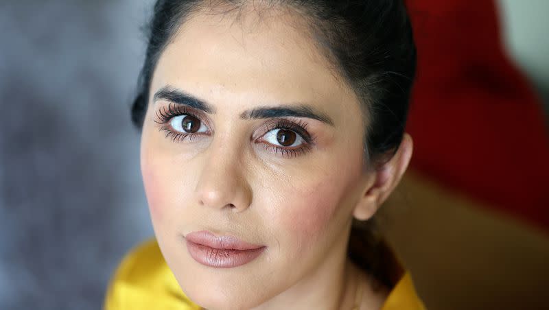 Crystal Bayat, an Afghan social activist, human rights advocate and founder of the Crystal Bayat Foundation, poses for a portrait at home in West Jordan on Wednesday, June 28, 2023.