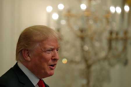 U.S. President Donald Trump takes the stage at a Hispanic Heritage Month celebration at the White House in Washington, U.S., September 17, 2018. REUTERS/Brian Snyder