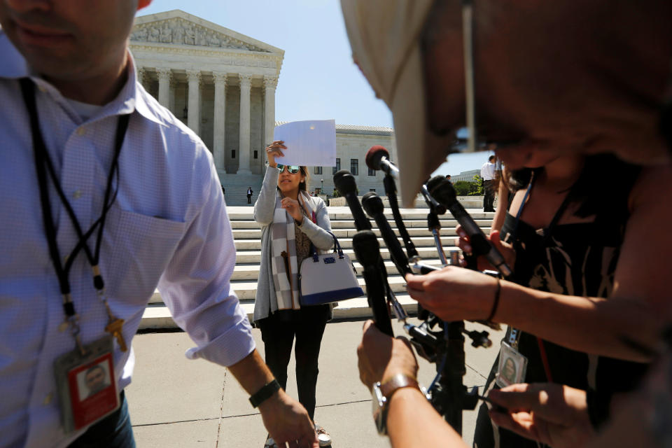 Television journalists prepare for a news conference on the plaza in front of the U.S. Supreme Court building on June 9, 2016.