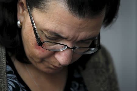 Rosemary Hernandez, the wife of Pedro Hernandez who is charged with the abduction and murder of Etan Patz, departs the Manhattan Supreme Court in New York May 5, 2015, after the jury retired for the day without reaching a verdict on Tuesday after telling the judge it was deadlocked in the murder trial of a man accused of killing 6-year-old Patz. REUTERS/Carlo Allegri