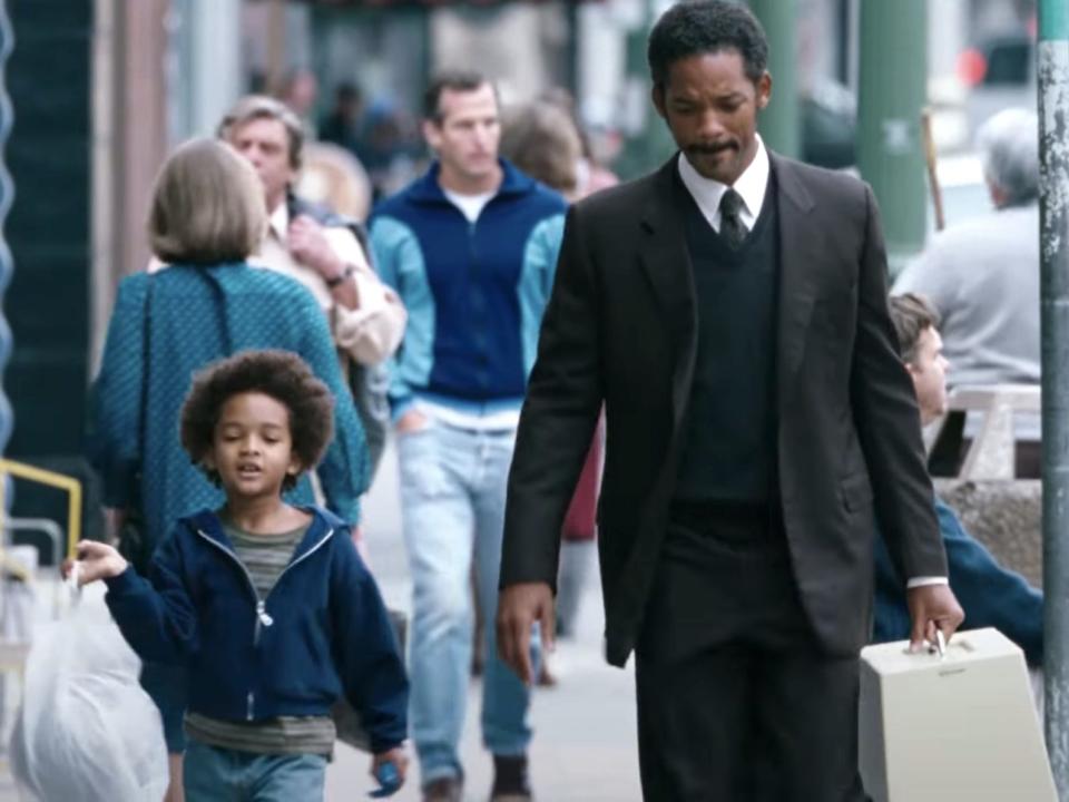 Jaden Smith and Will Smith walking down a street in "The Pursuit of Happyness."