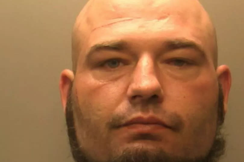 John Smith, 35, reversed his vehicle into a police car in Abercarn, Caerphilly and dragged it for yards before driving off