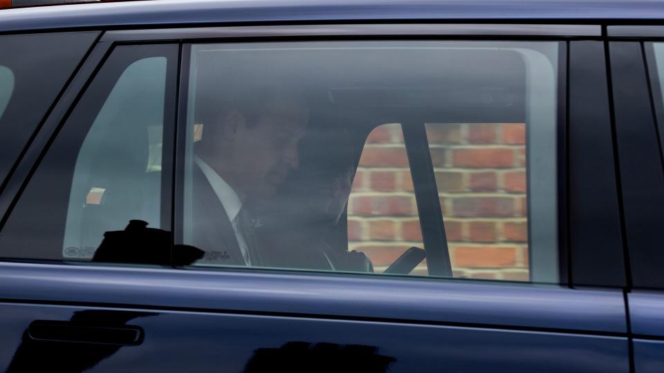 Prince William and Kate Middleton in the back of a car