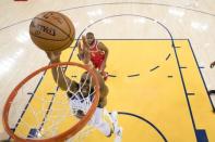 May 20, 2018; Oakland, CA, USA; Golden State Warriors forward Andre Iguodala (9) shoots the basketball against Houston Rockets guard Chris Paul (3) during the first half in game three of the Western conference finals of the 2018 NBA Playoffs at Oracle Arena. The Warriors defeated the Rockets 126-85. Mandatory Credit: Kyle Terada-USA TODAY Sports