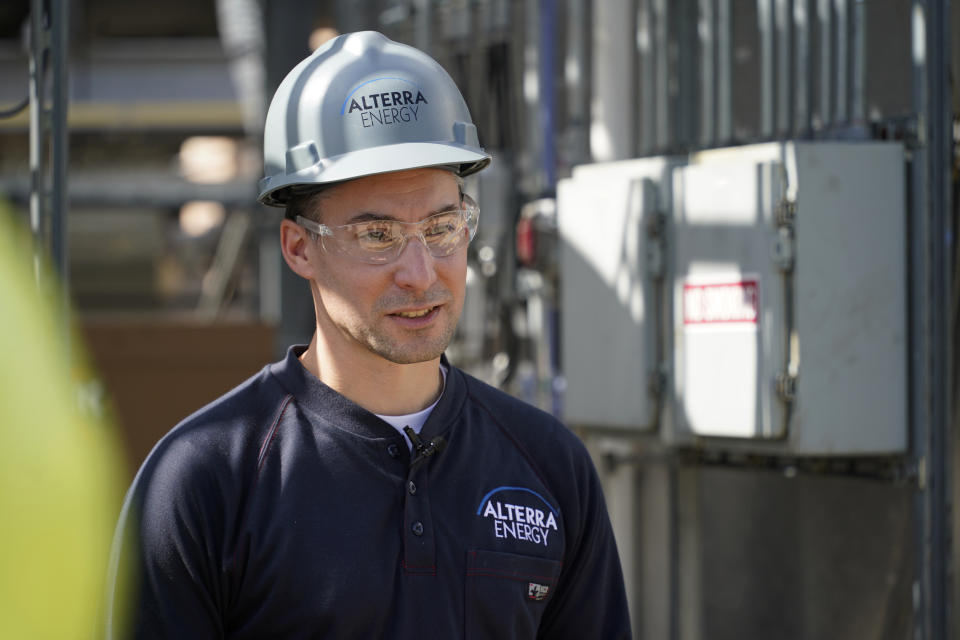 CORRECTS LAST NAME TO DEBENEDICTIS FROM BENDICTIS - Jeremy DeBenedictis, President of Alterra Energy, talks about how the company receives plastics from recycling facilities and processes it into a fluid that is then used in the manufacture of plastic, from their facility in Akron, Ohio on Thursday, Sept. 8, 2022. “Our mission is to solve plastic pollution,” said DeBenedictis, company president. “That is not just a tag line. We all truly want to solve plastic pollution.” (AP Photo/Keith Srakocic)